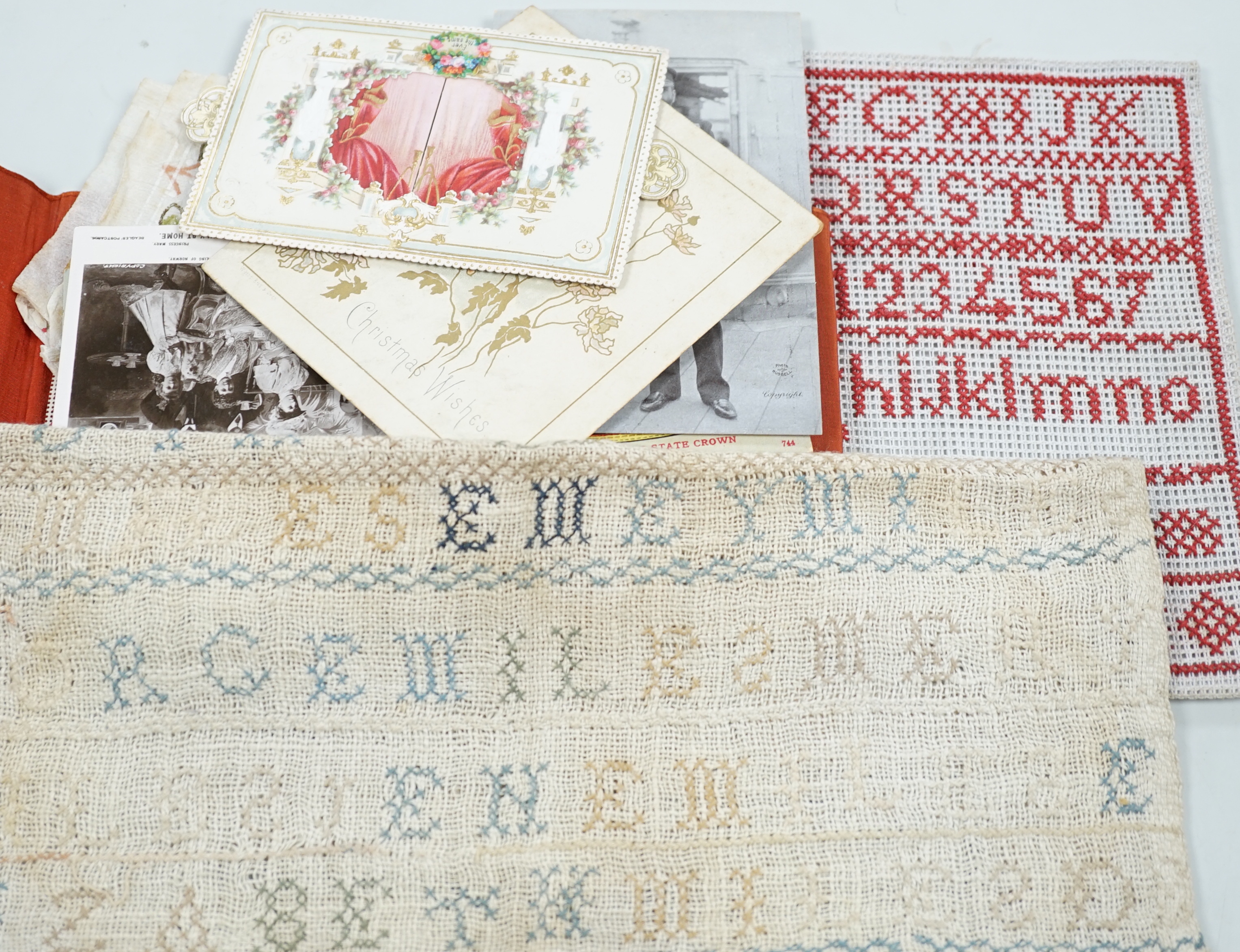 A group of various frameless samplers, postcards etc